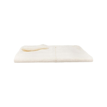 Detalle lateral del plaid de lino blanco con flecos de Bed and Philosophy