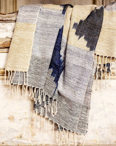 Caravane Ikat silk and cotton throw in an interior setting