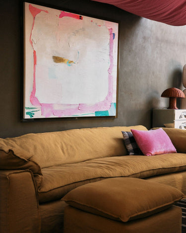 Nomad Burnt Ocher Linen Ottoman with Removable Cover by HK Living in a styled setting