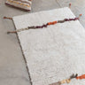 Alfombra reversible Zabol en un dormitorio cálido