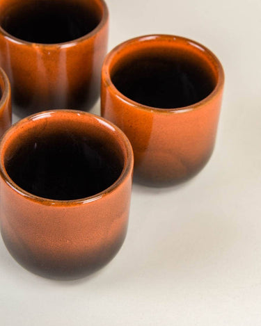 Vista superior del set de tazas rojas de Rivêt - Indochineur