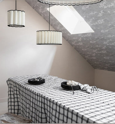 Set of 4 washed linen napkins with off-white tartan, on a table by Le Monde Sauvage