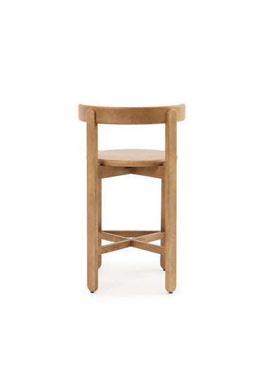 lectura frontal del volumen de silla alta de madera en teca de Gabrielle Paris