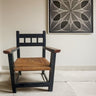 Sillón antiguo de madera y cuerda