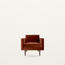 Sillón marrón caramelo tapizado de Broste Copenhagen