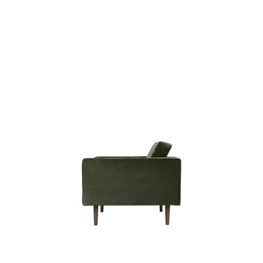 Sillón verde hoja tapizado visto de perfil