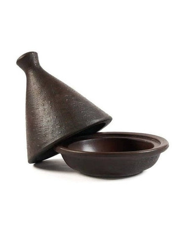 Detalle de tagine de terracota para cocina marroquí