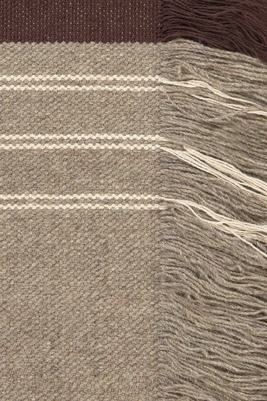 Detalle de la textura tejida de un tapiz de algodón y yute natural