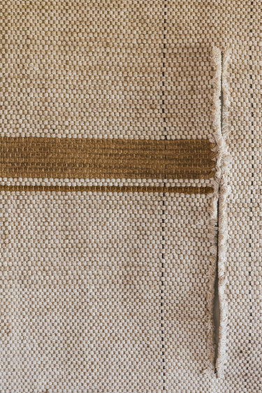 Detalle de las texturas de algodón y yute del tapiz multicolor Pedregal