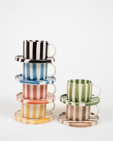 Terracotta striped ceramic cup and saucer for coffee or tea