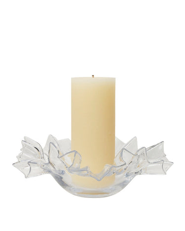 Vaciabolsillos decorativo de cerámica texturizada de Broste Copenhagen, recipiente de borde ondulado con una vela