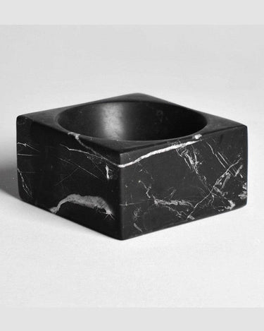 Small marble pocket emptier