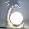 Lámpara vintage de cerámica blanca con palmera