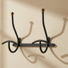 Perchero vintage de pared negro y dorado